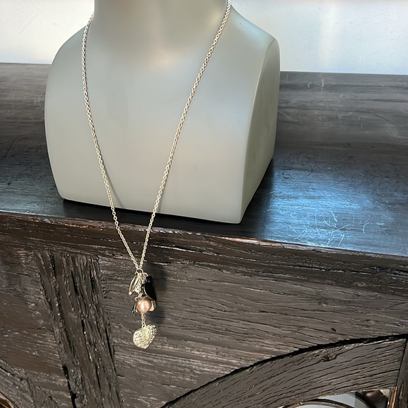 Long silver toned necklace with 8 charms in black and silver heart bead ring - Picture 8 of 9